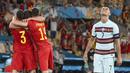 Penyerang timnas Portugal, Cristiano Ronaldo bereaksi ketika para pemain Belgia merayakan kemenangan setelah babak 16 besar Euro 2020 di Estadio La Cartuja, Sevilla, Spanyol, Senin (28/6/2021) dini hari WIB. Belgia mendepak juara bertahan Portugal berkat kemenangan 1-0 (Lluis Gene/Pool Photo via AP)