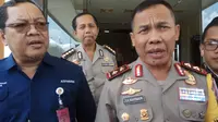 Kapolda SumselIrjen Pol Zulkarnain Adinegara dan Ketua KPU Sumsel Aspahani (Liputan6.com / Nefri Inge)