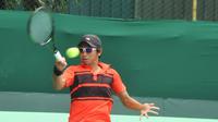 Petenis Indonesia, Christoper Rungkat, bakal tampil pada playoff Piala Davis Grup II Zona Asia-Oseania 2016 kontra Sri Lanka, di Manahan, Solo, 15-19 Juli. (Bola.com/Romi Syahputra)