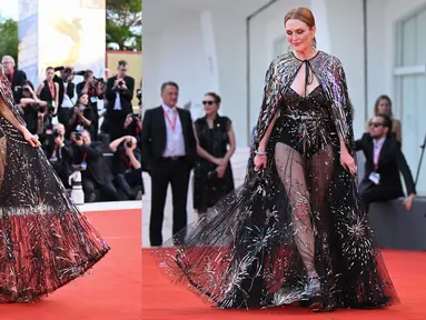 Aktris Amerika Serikat sekaligus Presiden Juri Venice Film Festival 2022 Julianne Moore tiba untuk upacara pembukaan dan pemutaran film "White Noise" di Venesia, Italia, Rabu (31/8/2022). Julianne Moore mencuri perhatian saat menghadiri Venice Film Festival 2022. (Marco BERTORELLO/Tiziana FABI/AFP)