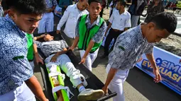 Kegiatan ini dalam rangka bulan Pengurangan Resiko Bencana. (CHAIDEER MAHYUDDIN/AFP)