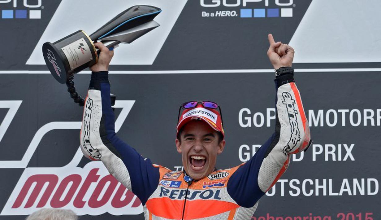 Selebrasi kemenangan Marquez. (AFP PHOTO/ROBERT MICHAEL)