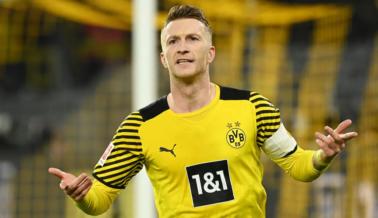 Marco Reus telah menjadi motor permainan di lini tengah Borussia Dortmund selama bertahun-tahun. Pria berusia 33 tahun tersebut mampu tampil gemilang pada musim ini dengan mencetak 13 gol dan 13 assist dalam 34 penampilannya. (AFP/Ina Fassbender)