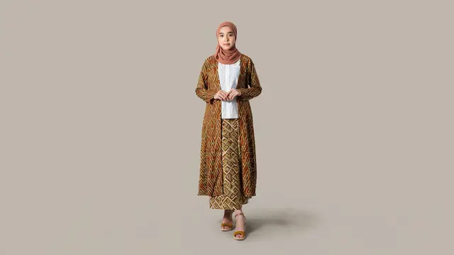 Model Baju Batik Terbaru yang Cocok untuk Wanita Berhijab/Ilustrasi oleh AI