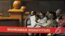 Para saksi yang berasal dari Papua ini memperhatikan jalannya persidangan dengan seksama, Jakarta, Kamis (14/8/2014) (Liputan6.com/Andrian M Tunay)