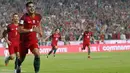 Striker Portugal, Andre Silva, melakukan selebrasi usai mencetak gol ke gawang Swiss pada laga kualifikasi Piala Dunia di Stadion Luz, Selasa (10/10/2017). Portugal menang 2-0 atas Swiss. (AP/Armando Franca)