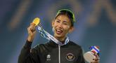 Atlet atletik Indonesia, Emilia Nova, usai memenangi lomba dan meraih emas nomor heptathlon (tujuh lomba) SEA Games 2025 di Stadion Supachalasai Bangkok, Thailand Selasa (16/12/2025) malam. Luapan kegembiraan terpancar pada raut wajah atlet atletik Indonesia Emilia Nova usai berhasil meraih medali emas nomor heptathlon (tujuh lomba) SEA Games 2025 Thailand. (Bola.com/Bagaskara Lazuardi)