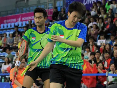 Pebulutangkis Ganda Campuran Indonesia, Tontowi Ahmad dan Liliyana Natsir, gagal menambah pundi emas Indonesia di Asian Games 2014, (29/9/2014). (Dok Humas PBSI/Nafielah)