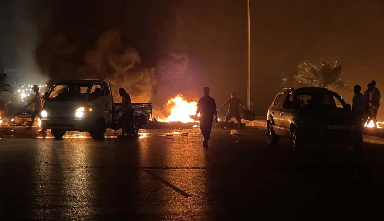 Langkah ini diambil beberapa jam setelah Israel mengatakan bahwa Mangoush telah mengadakan pertemuan dengan mitranya dari Israel, Eli Cohen, minggu lalu di Roma. (Photo by Mahmud TURKIA / AFP)