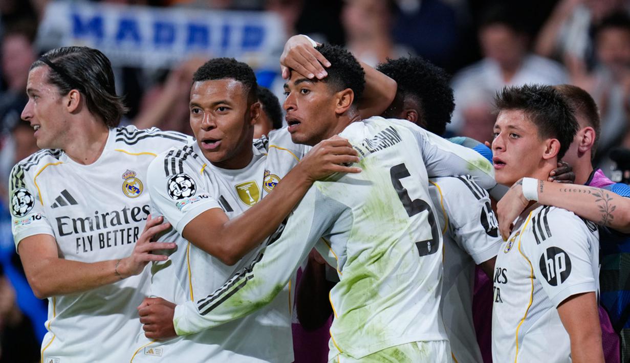 Tambahan tiga poin berharga ini memastikan Real Madrid mencatatkan tiga kemenangan sempurna dari tiga laga Liga Champions musim ini, membawa mereka melesat ke posisi kelima klasemen sementara dengan total 9 poin. (AP Photo/Manu Fernandez)