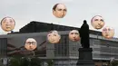 Balon yang menggambarkan wajah pemimpin negara anggota G7 menghiasi kota Dresden, Jerman, (27/5/2015). Kanselir Jerman Angela Merkel mengatakan, tak terbayangkan bila Rusia berpartisipasi dalam pertemuan G7. (REUTERS/Fabrizio Bensch)