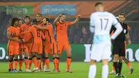 Timnas Belanda menang 2-0 atas Norwegia pada laga terakhir Grup G kualifikasi Piala Dunia 2022 zona Eropa di Stadion Feijenoord, Rabu (17/11/2021) dini hari WIB. (AFP/John Thys)