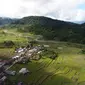 Foto Desa Ngata Toro yang dikelilingi gunung dan hutan Taman Nasional Lore Lindu, Sigi, yang diambil dari udara (drone). (Foto: Dony-TNLL).
