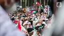 Sebagian besar mereka membawa bendera, syal, dan juga baju berlambangkan Palestina hingga poster kecaman atas keganasan serangan Israel yang berdampak pada rakyat sipil Palestina. (Liputan6.com/Faizal Fanani)