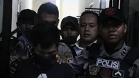 Pelaku Oyong (32) yang sehari-hari bekerja di penambangan itu, ditangkap polisi saat melarikan diri ke rumah rekannya yang berdomisili di Kelurahan Tanggikiki, Kota Gorontalo. (Liputan6.com/ Arfandi Ibrahim)