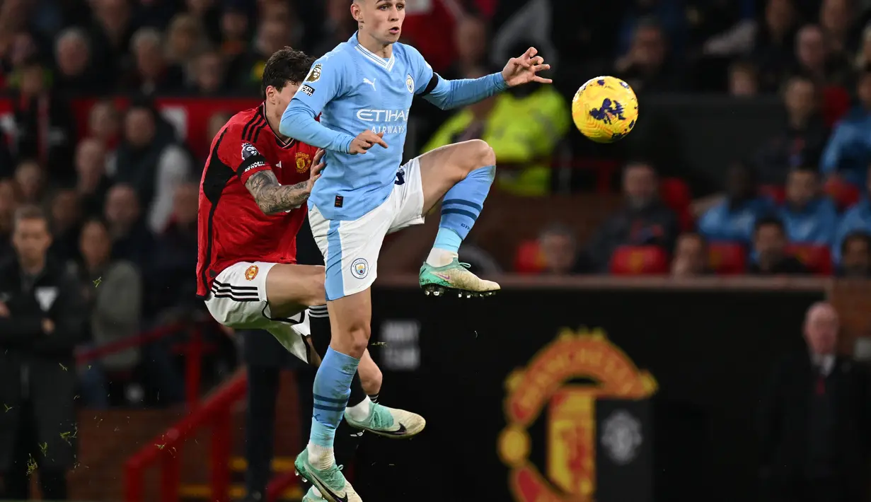 Gol ketiga Man City dicetak oleh Phil Foden di menit ke-80. (Paul ELLIS / AFP)