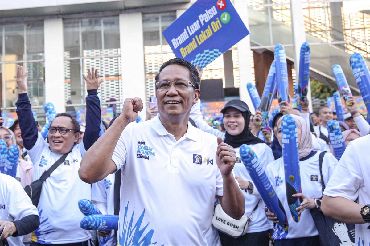 FOTO: Antuasia Warga Warga Ikuti Fun Walk Peringatan Hari Kekayaan Intelektual
