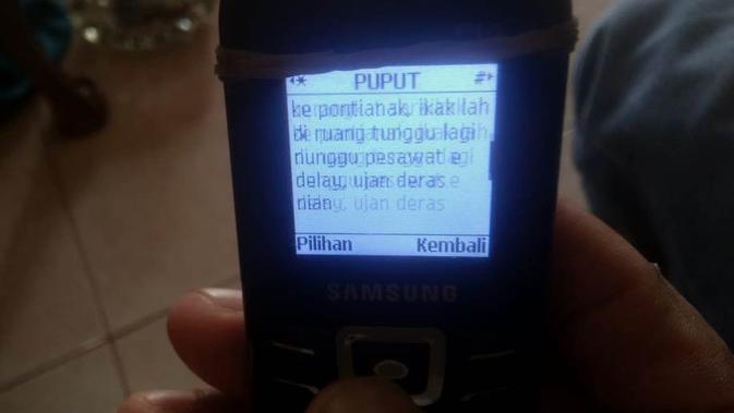 Pesan terakhir penumpang pesawat Sriwijaya Air SJY 182 Indah Halimah Putri, warga Sungai Pinang Ogan Ilir Sumsel (Liputan6.com / Nefri Inge)