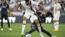 <p>Real Madrid mencatatkan penguasaan bola 60 persen, sementara AC Milan 40 persen. (AP Photo/Ashley Landis)</p>