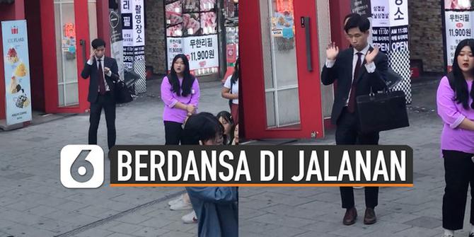 VIDEO: Aksi Pede Pria Berjas Berdansa di Jalanan