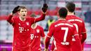 Penyerang Bayern Munchen, Thomas Mueller, melakukan selebrasi usai mencetak gol ke gawang Hoffenheim pada laga Bundesliga di Stadion Allianz Arena, Sabtu (30/1/2021). Bayern Munchen menang dengan skor 4-1. (Sven Hoppe/dpa via AP)