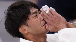 Pejudo dari Taiwan, Yang Yung-wei bereaksi setelah kalah dari Naohisa Takato, dari Jepang, dalam perebutan medali emas judo -60kg putra pada Olimpiade Musim Panas 2020, Sabtu, 24 Juli 2021, di Tokyo. (AP/Jae C.Hong)