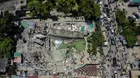 Pemandangan udara Hotel Le Manguier yang hancur akibat gempa bumi, di Les Cayes, Haiti, , Sabtu (14/8/2021). Wilayah Negara Haiti diguncang gempa berkekuatan magnitudo 7,1 pada Sabtu, 14 Agustus 2021 pukul 08.29.10 waktu setempat yang menewaskan lebih dari 300 jiwa. (AP Photo/Ralph Tedy Erol)