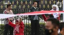 Presiden Joko Widodo didampingi Kapolri Jenderal Listyo Sigit Prabowo dan Anggota Wantimpres Habib Luthfi bin Yahya melepas Kirab Merah Putih di depan Istana Merdeka Jakarta, Minggu (28/7/2022). Lintas elemen mulai dari Pemerintah, tokoh agama, tokoh bangsa, Polri, pemuda hingga mahasiswa menggelar kegiatan kirab merah putih sebagai wujud untuk menjunjung tinggi persatuan dan kesatuan Bangsa Indonesia. (Liputan6.com/Johan Tallo)