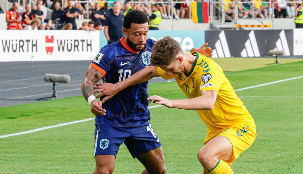 Lithuania mencetak gol balasan lewat Gvidas Gineitis dan Edvinas Girdvainis yang membuat kedudukan imbang. (AFP/Petras Malukas)