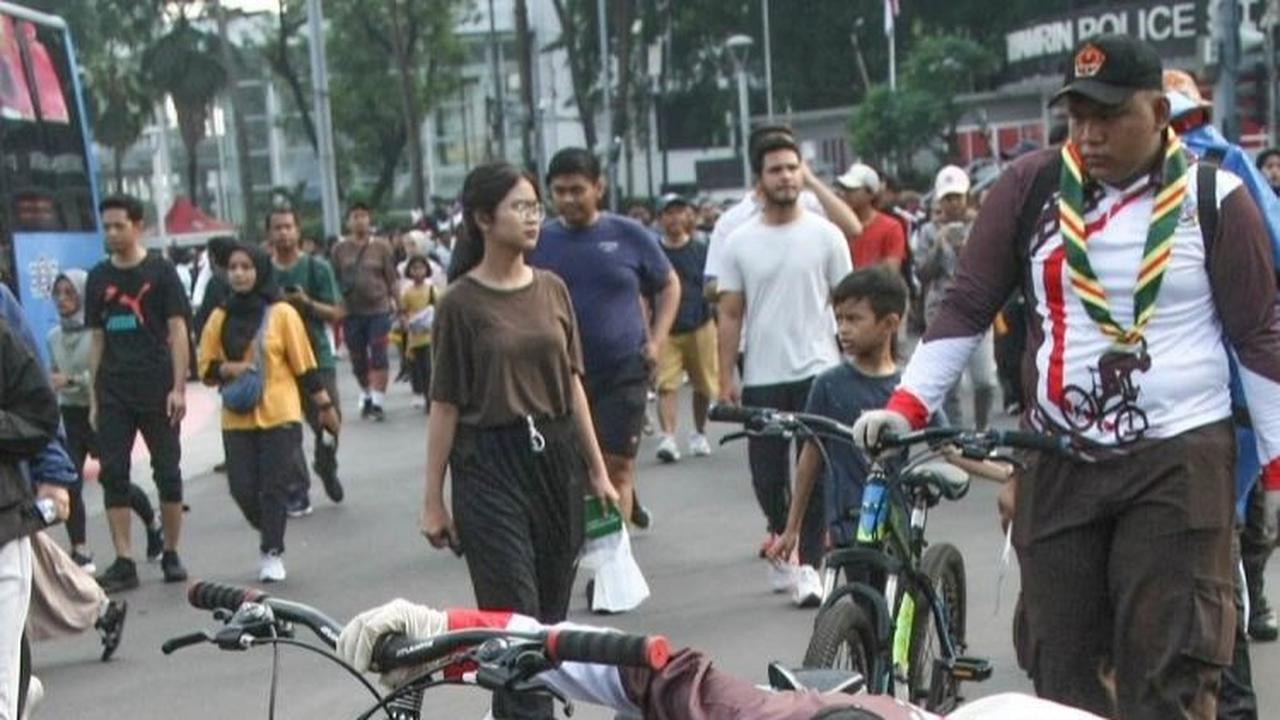 Dalam aksi tersebut, anggota Pramuka terlihat kompak mengenakan seragam. Foto: merdeka.com / Arie Basuki<br>