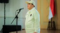 Menteri Pemuda dan Olahraga (Menpora) RI, Erick Thohir, mengukuhkan Tim Indonesia untuk SEA Games di Auditorium Wisma Kementerian Pemuda dan Olahraga (Kemenpora) RI, Jakarta Pusat, pada Jumat (5/12/2025) siang WIB. (Bola.com/Bagaskara Lazuardi)