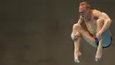 Atlet loncat indah Rusia, Ilia Zakharov bersaing saat tampil dalam final springboard 3 meter putra dalam Kejuaraan Akuatik Dunia di London, Inggris, (13/5/2016). (REUTERS / Andrew Boyers)