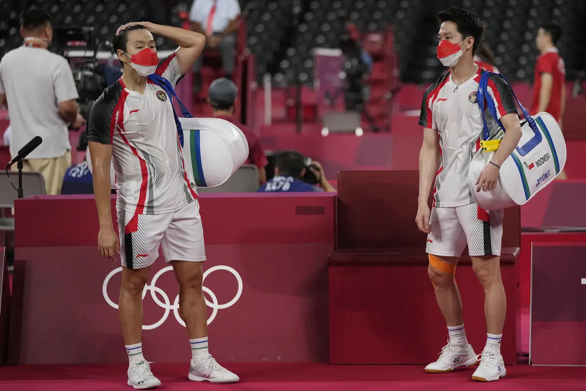 Foto: Angkat Koper dari Olimpiade Tokyo 2020, Pasangan Marcus/Kevin Dipaksa Tunduk oleh Pasangan Malaysia di Babak 16 Besar