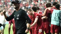 Manajer Liverpool, Jurgen Klopp, berhasil membawa timnya menjuarai Piala Super Eropa 2019, setelah mengalahkan Chelsea lewat adu penalti dengan skor 5-4 (skor 2-2), di Vodafone Park, Istanbul, Rabu (4/8/2019). (AFP/Ozan Kose)
