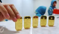 Sedangkan harga buyback emas atau pembelian kembali, naik Rp 1.000 menjadi Rp 525 ribu per gram, Jakarta, Senin (10/10). Itu artinya jika anda menjual emas, maka Antam akan membayar Rp 525 ribu per gram. (Liputan6.com/Angga Yuniar)