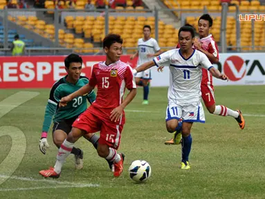 Sesekali Xouxana Sihalath agresif menjaga pertahanan Laos dari gempuran serangan Filipina (Liputan6.com/ Helmi Fithriansyah)
