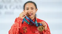 Ni Nengah Widiasih memecahkan rekor ASEAN Para Games (APG) atas namanya sendiri saat tampil di kelas 45kg putri cabang olahraga para-powerlifting ASEAN Para Games 2022 di Hotel Paragon Solo, Jawa Tengah, Senin (1/8/2022).  (NPC Indonesia)