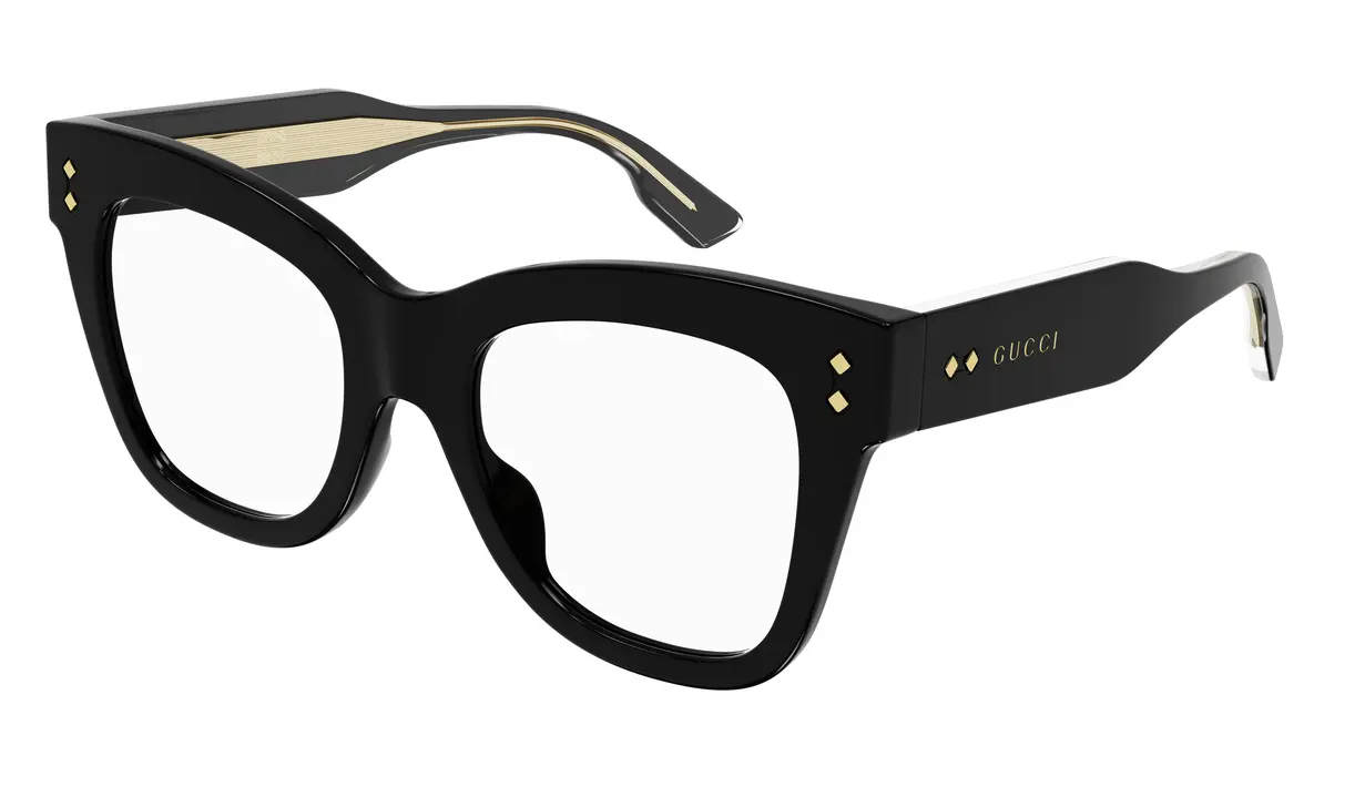 Dua versi dari kacamata hitam bundar bernuansa vintage ini juga hadir dalam warna hitam dan coeklat yang dicirikan dengan ukurannya yang besar dengan paku logam ikonis (Foto: Gucci)