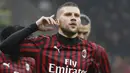 Penyerang AC Milan, Ante Rebic berselebrasi usai mencetak gol ke gawang Torino pada pertandingan lanjutan Liga Serie A Italia di stadion San Siro, di Milan, Italia, (18/2/2020). Gol tunggal Rebic mengantar Milan menang tipis atas Torino 1-0. (AP Photo/Antonio Calanni)