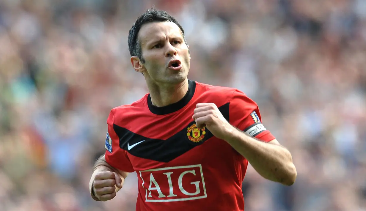 Ryan Giggs merupakan pemain andalan Sir Alex Ferguson di sektor sayap. Manajer Timnas Wales ini, sukses mencetak 28 gol dari 145 penampilannya di Liga Champions. (AFP/Paul Ellis)
