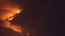 Pemandangan kebakaran hutan di Xichang, Provinsi Sichuan, China, Selasa (31/3/2020). Kebakaran hutan menewaskan 18 anggota pemadam kebakaran dan seorang buruh tani hutan setempat yang bertugas sebagai penunjuk jalan bagi anggota pemadam kebakaran tersebut. (Xinhua/Liu Mingke)