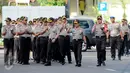 Kapolri Jenderal Tito Karnavian saat tiba di Krimsus Polda Metro Jaya, Jakarta, Rabu (18/1). Kapolri akan memberikan penghargaan kepada anggota kepolisian yang berhasil mengungkap dengan cepat kasus perampokan di Pulomas. (Liputan6.com/Gempur M Surya)