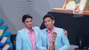 Ekspresi Rizki-Ridho DA (Dangdut Akademi) memberi sambutan saat memperoleh penghargaan kategori duo/grup dangdut terpopuler dalam Indonesian Dangdut Awards 2018 di Studio 5 Indosiar, Jakarta, Jumat (12/10). (Liputan6.com/Faizal Fanani)