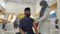 Lansia di Gorontalo saat melakukan Vaksinasi Covid-19. foto: Istrimewa (Arfandi Ibrahim/Liputan6.com)