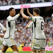 Jude Bellingham mencetak gol kedua untuk Los Merengues pada menit ke-56. Dan Joselu menutup pesta gol Real Madrid ke gawang Cadiz CF di menit ke-90+3. (OSCAR DEL POZO/AFP)