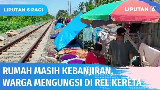 VIDEO: Ratusan Warga Korban Banjir Serang Terpaksa Mengungsi di Jalur Rel Kereta Api