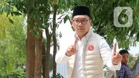 Ridwan Kamil menjelaskan, ia memilih berziarah ke makam Muhammad Husni (MH) Thamrin dan lainnya sebagai langkah awal kampanye karena menganggap mereka adalah sosok penting dalam sejarah Jakarta. (Liputan6.com/Herman Zakharia)