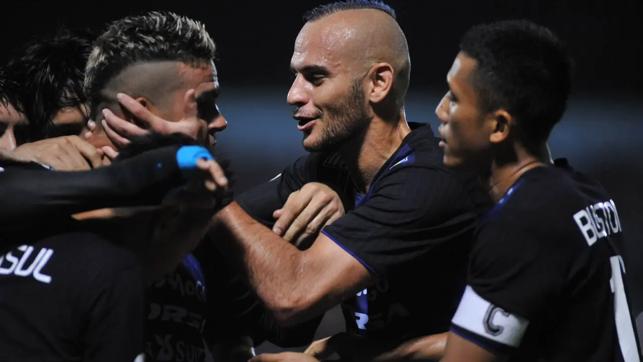Selebrasi Pemain Arema Cronus (Liputan6.com/Rana Adwa)