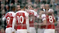 Para pemain Arsenal merayakan gol ke gawang Everton pada laga Premier League, di Stadion Emirates, London, Minggu (23/9/2018). (AFP/Adrian Dennis)
