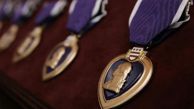 Purple Heart medals, bearing the image of Gen (AP PHOTO/CHARLES DHARAPAK)